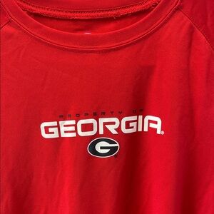 Georgia Bulldogs 
NCAA Red T-Shirt with black white logo